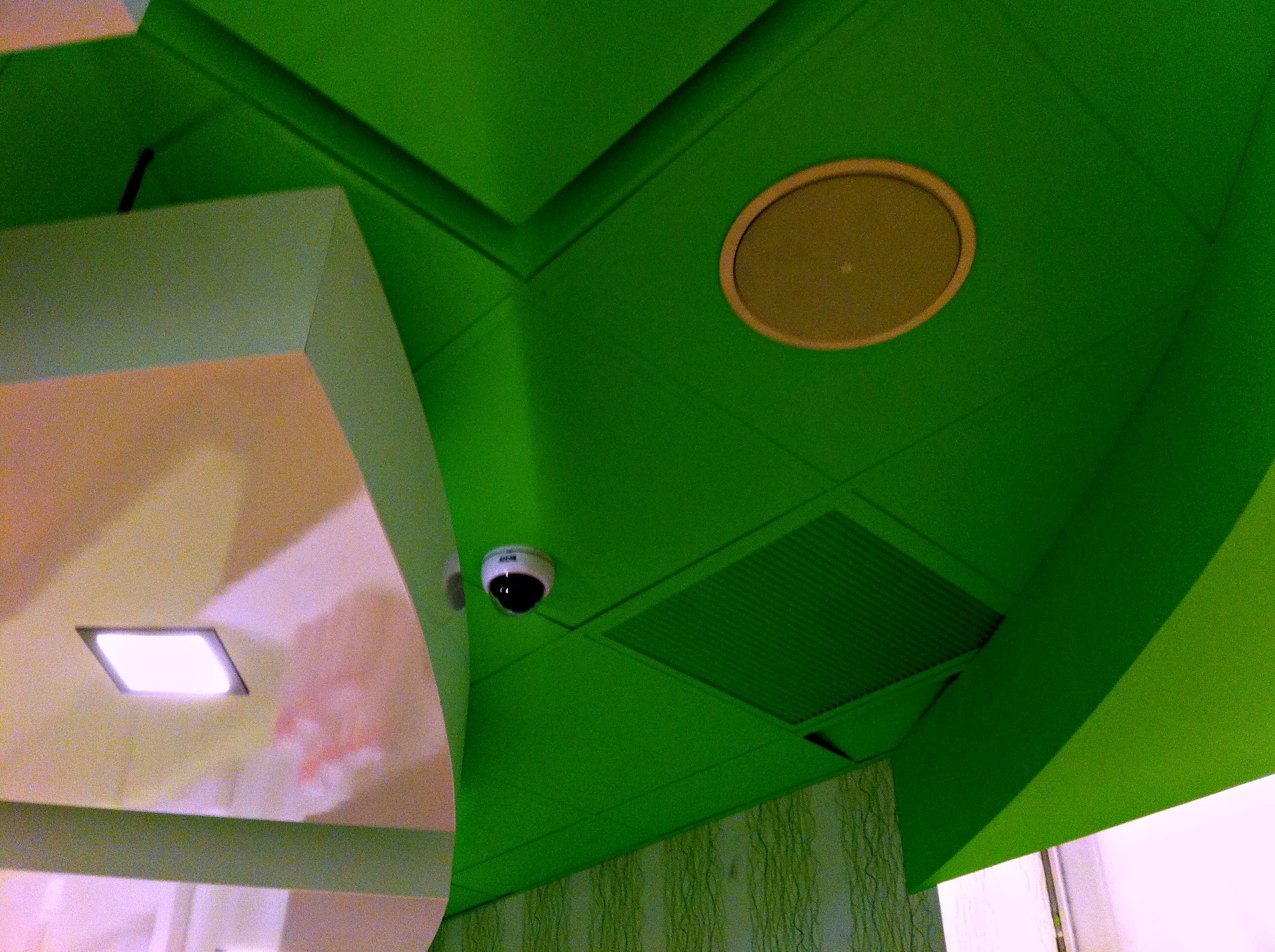 Dome camera mounted at a ceiling corner