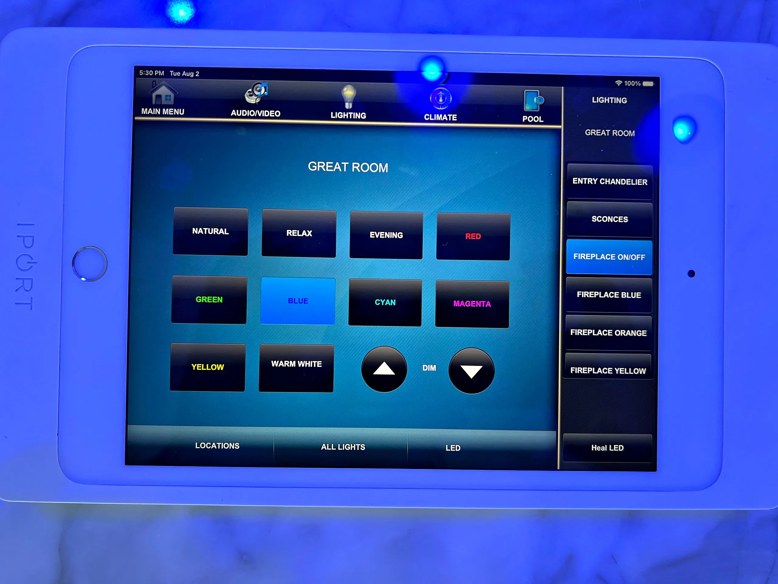 Smart home touch panel showing lighting scenes